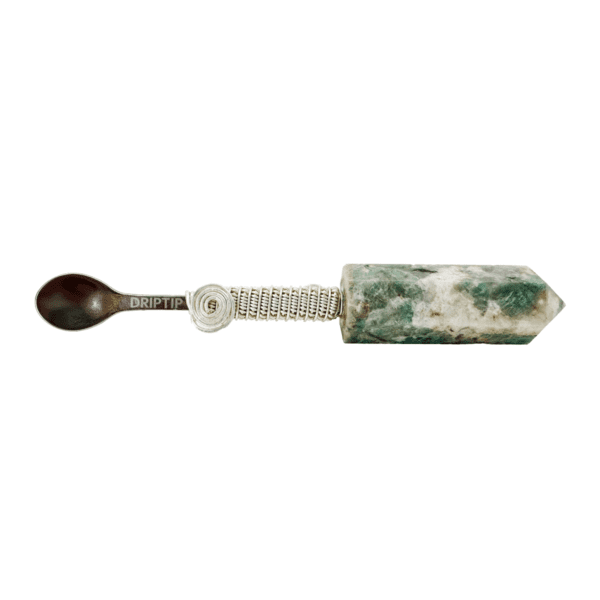 Green stone and metal spoon tool.