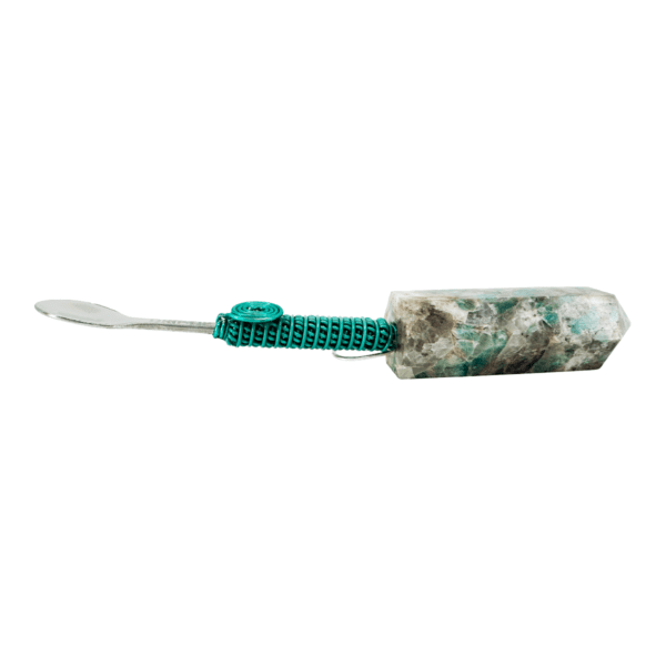 Green stone spoon with wire handle.