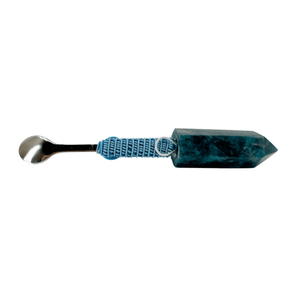 Crystal-handled spoon with blue cord.