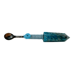 Blue gemstone spoon with metal handle.