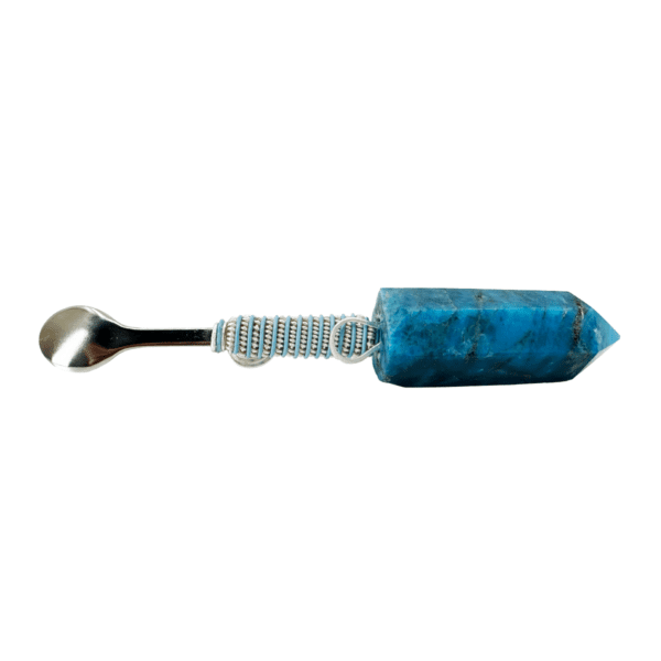 Blue crystal spoon with silver handle.