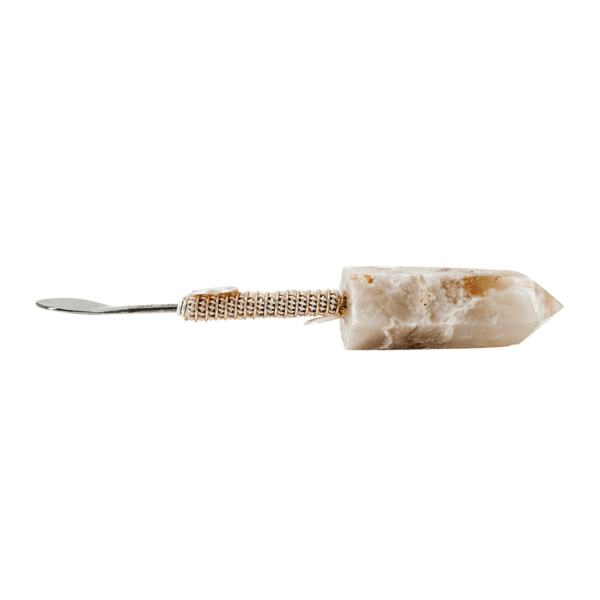 Crystal-topped, wire-wrapped spoon tool.