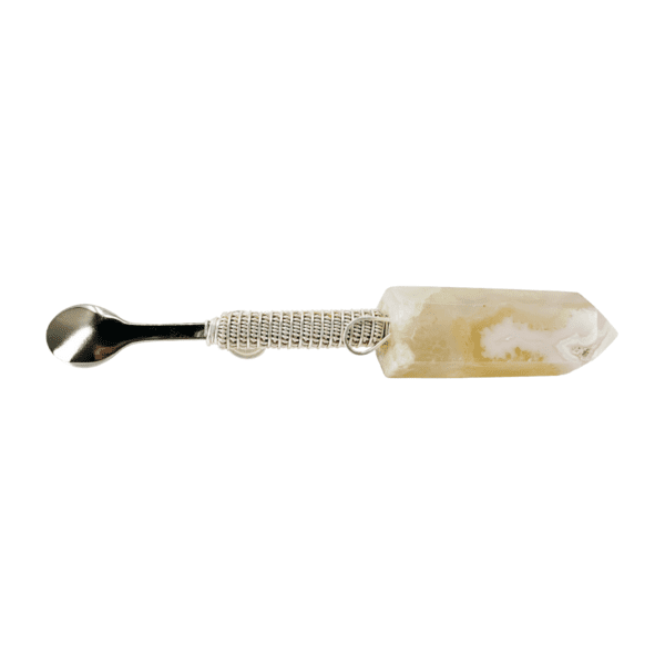 Crystal spoon with a silver handle.