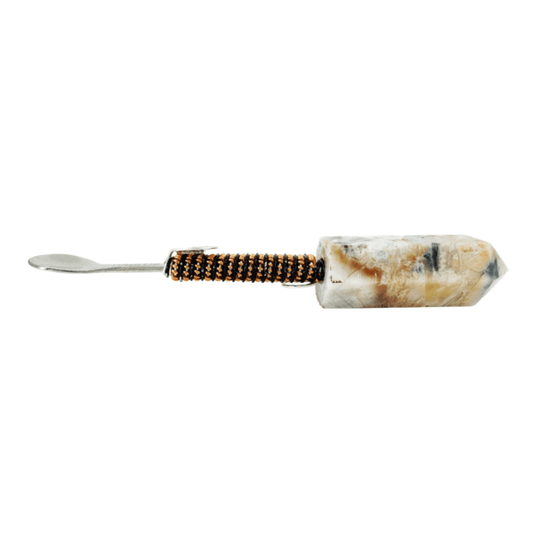 Stone spoon with beaded handle.