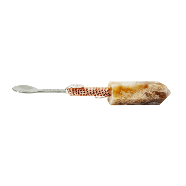 Crystal spoon with copper wire wrap.