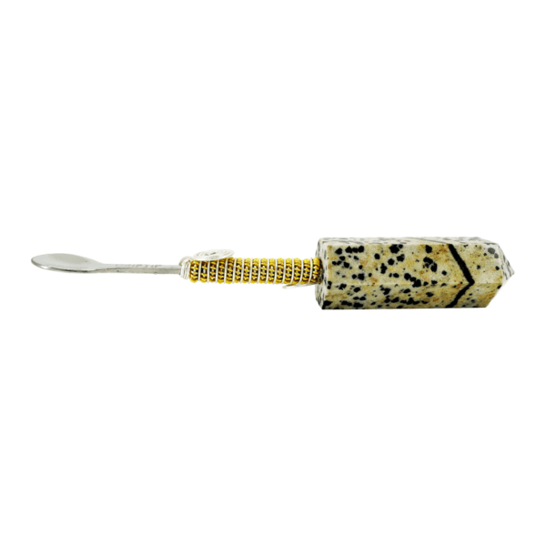 Stone spoon with gold wire handle.