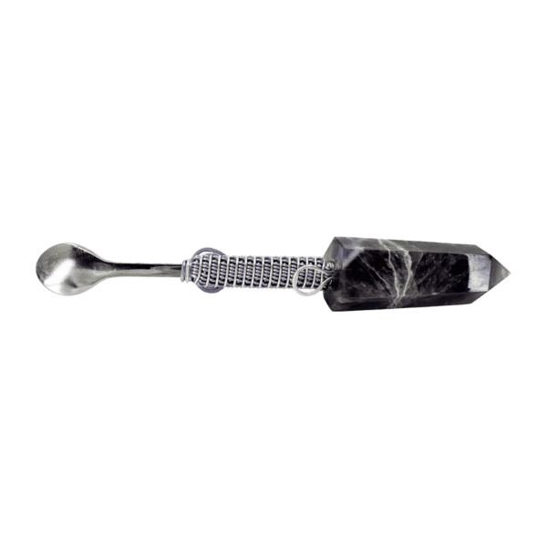 Black crystal spoon with silver handle.