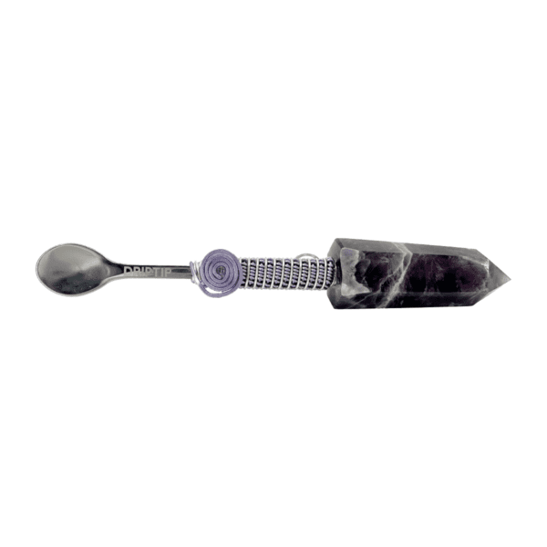 Amethyst crystal spoon with metal handle.