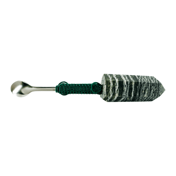 Stone and metal spoon with green wire.