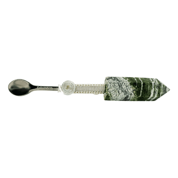 Green stone spoon with metal handle.