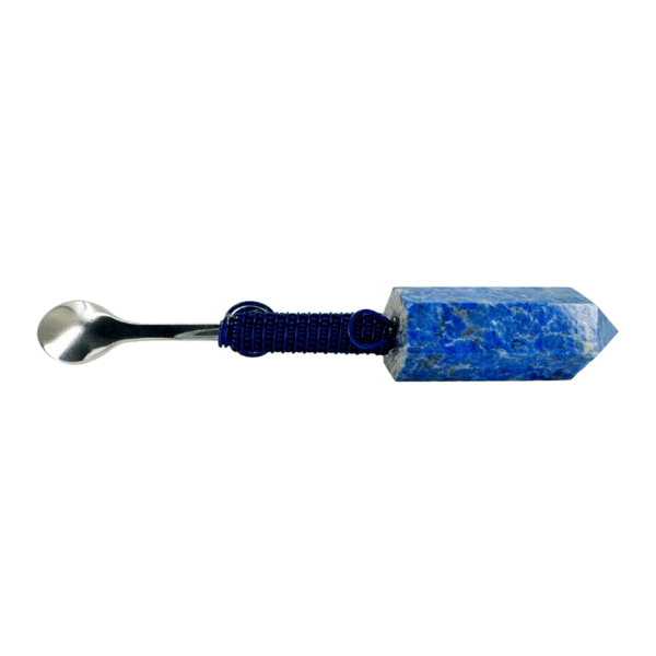 A blue stone with a metal handle.