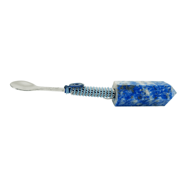 A blue and white toothbrush with a metal handle.