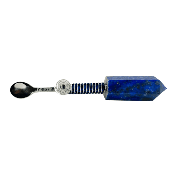 A spoon with a blue stone handle.