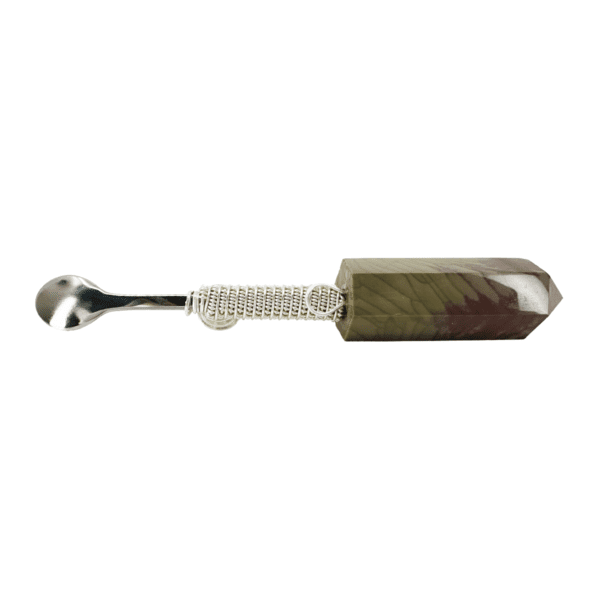 Silver spoon with a stone handle.