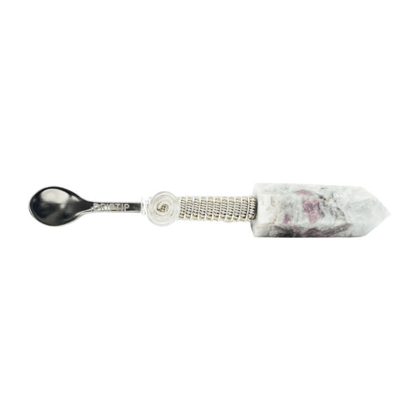 A spoon with a white handle and a purple flower on it.