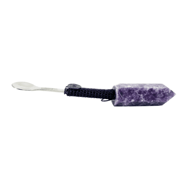 A purple stone key chain with a black handle.