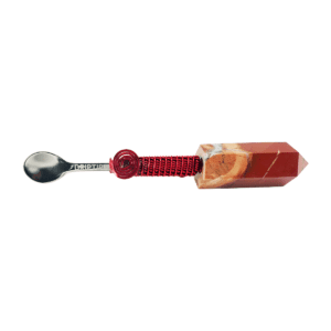 A spoon with an image of a piece of fruit.