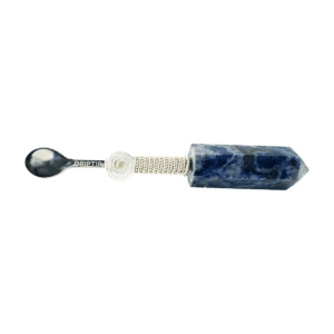 Silver spoon attached to blue crystal.