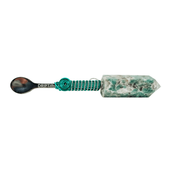 Green stone spoon with wire wrap.