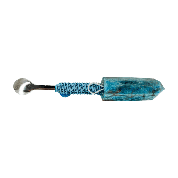 Blue crystal spoon with metal handle.