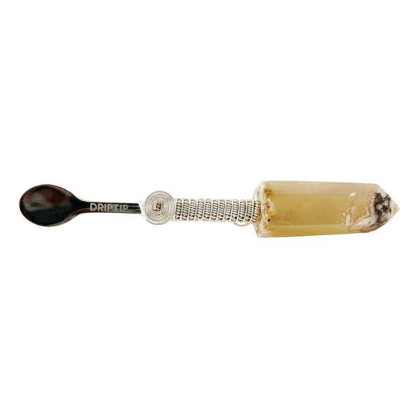 Silver spoon with a crystal handle.