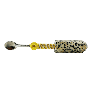 Dalmatian jasper spoon with gold trim.