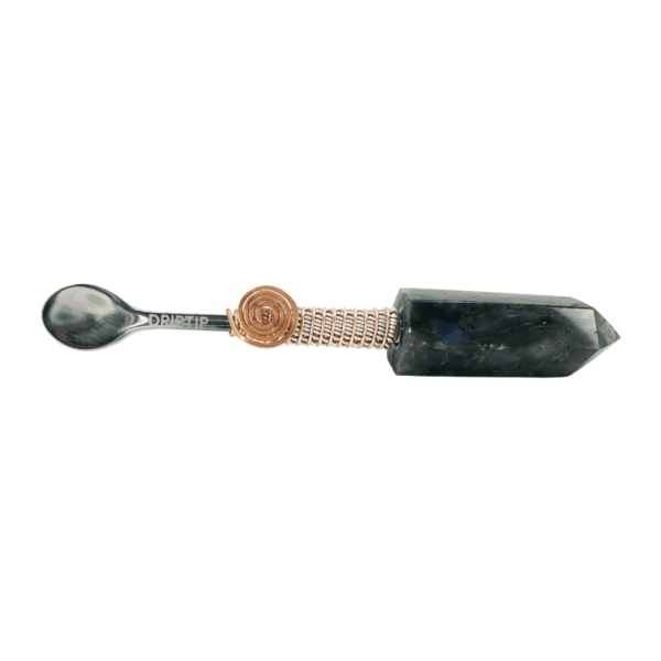 Crystal spoon with copper wire wrap.