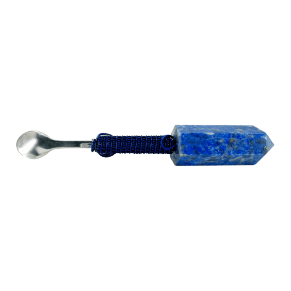 A blue stone with a metal handle.