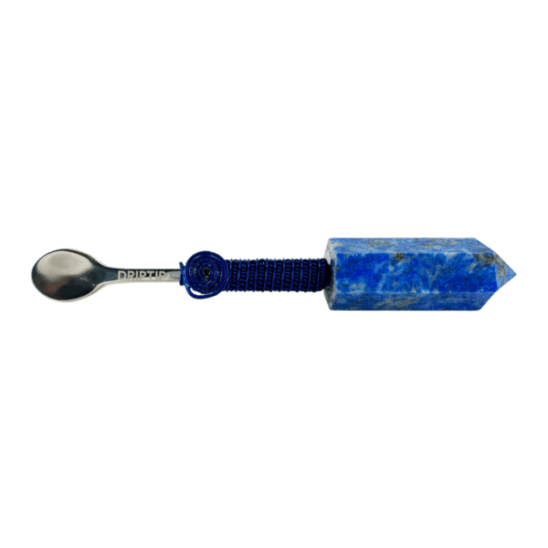 A spoon with a blue handle and black string.