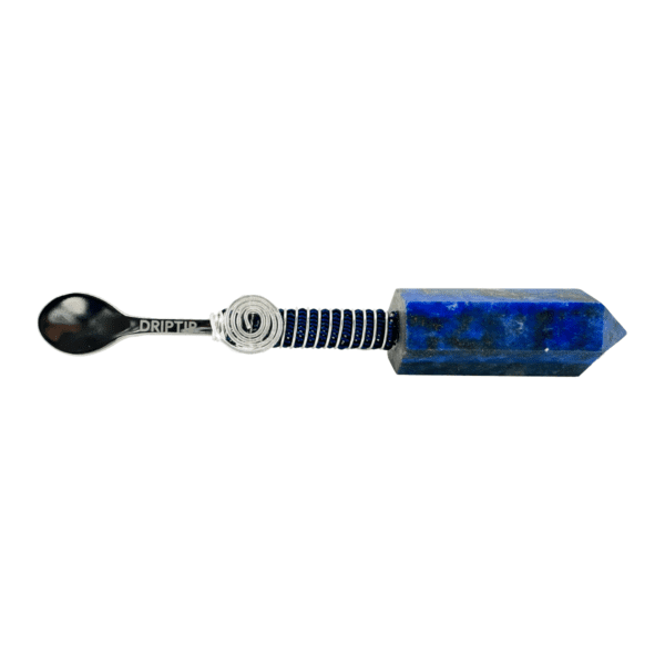 A spoon with a blue stone handle.