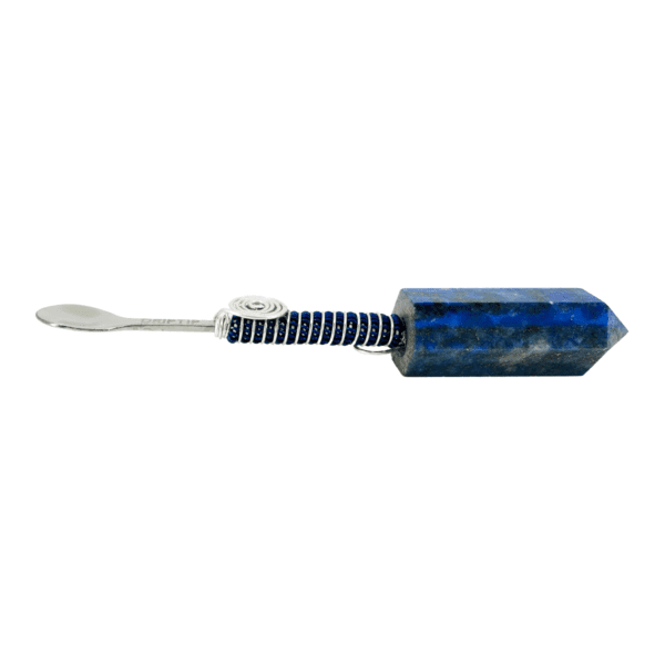 A blue stone with a metal handle.