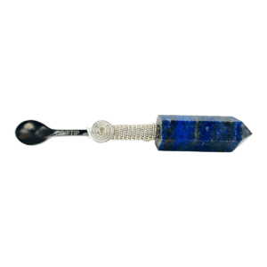 A spoon with a blue stone handle.