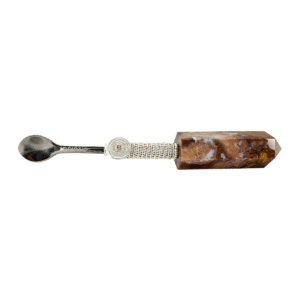 Crystal spoon with silver handle and wire wrap.