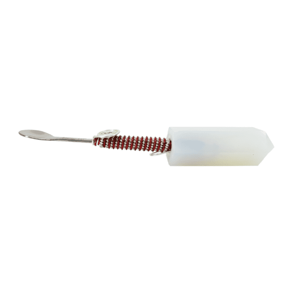 A white and red brush with a metal tip.