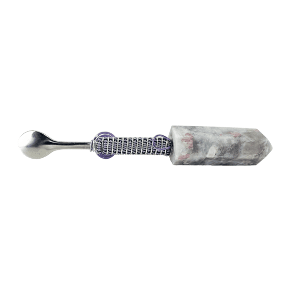 A purple and white knife with a silver handle.