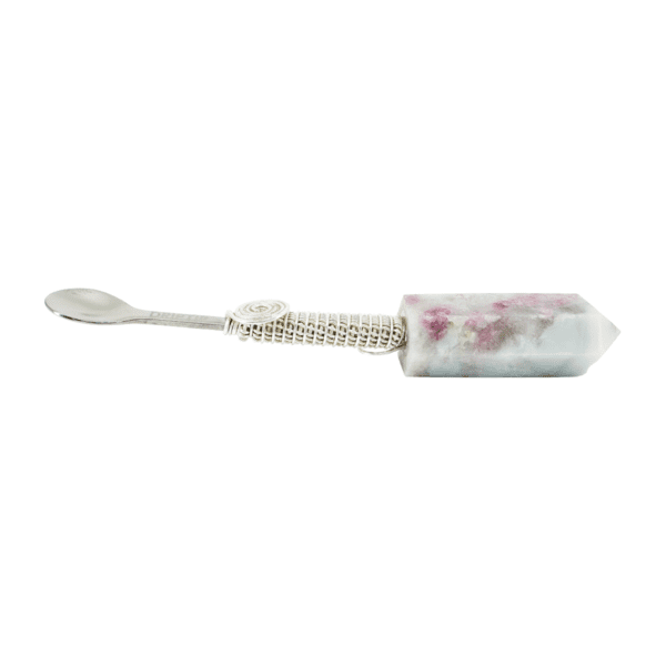 A white and pink flower print key chain.