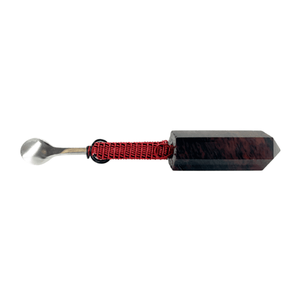 A red and black knife with a long handle.