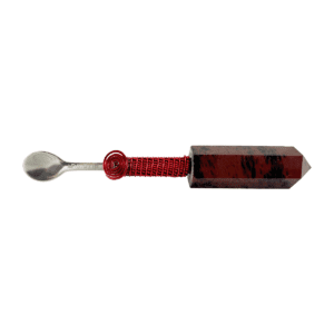 A spoon with a red handle and a red cord.