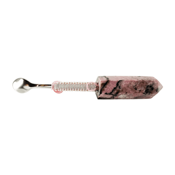 A pink and white tie dye keychain with a metal ball.