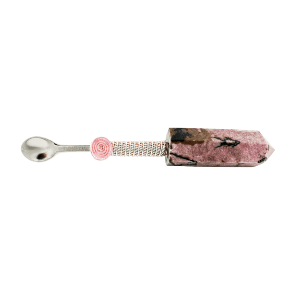 A spoon with pink and white marble handle.