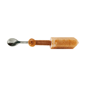 A silver spoon with a wrapped gemstone handle.