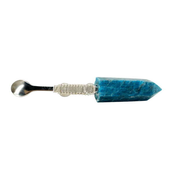 Blue crystal spoon with silver wire.