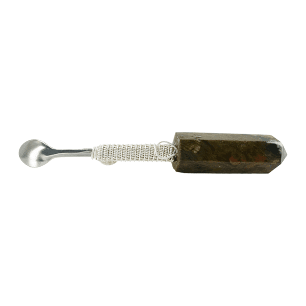 Silver spoon with a crystal handle.