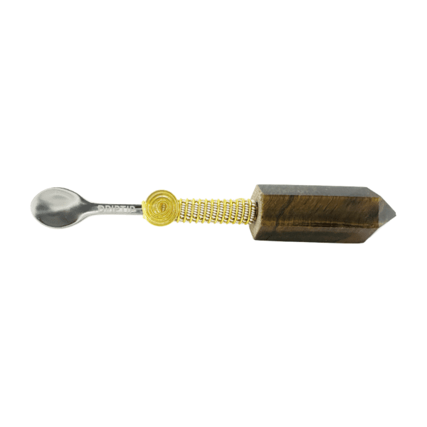 Gold-wrapped spoon with a crystal handle.