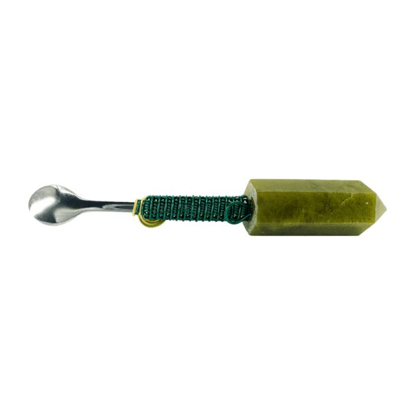 Green crystal spoon with wire wrap.