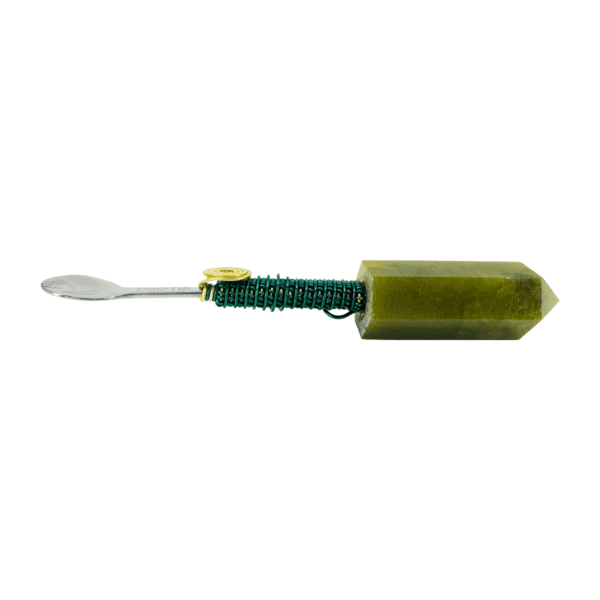 Green crystal spoon with metal wire wrap.